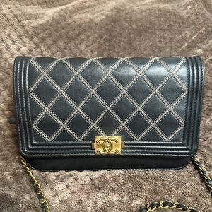 CHANEL Black and Gold Quilted Crossbody Bag